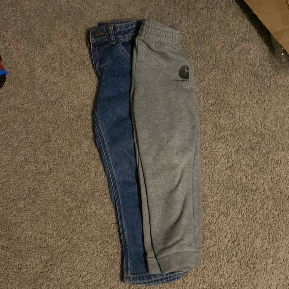2 pair carhartt pants